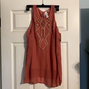 Very cute summer top, never worn.  Still with tags